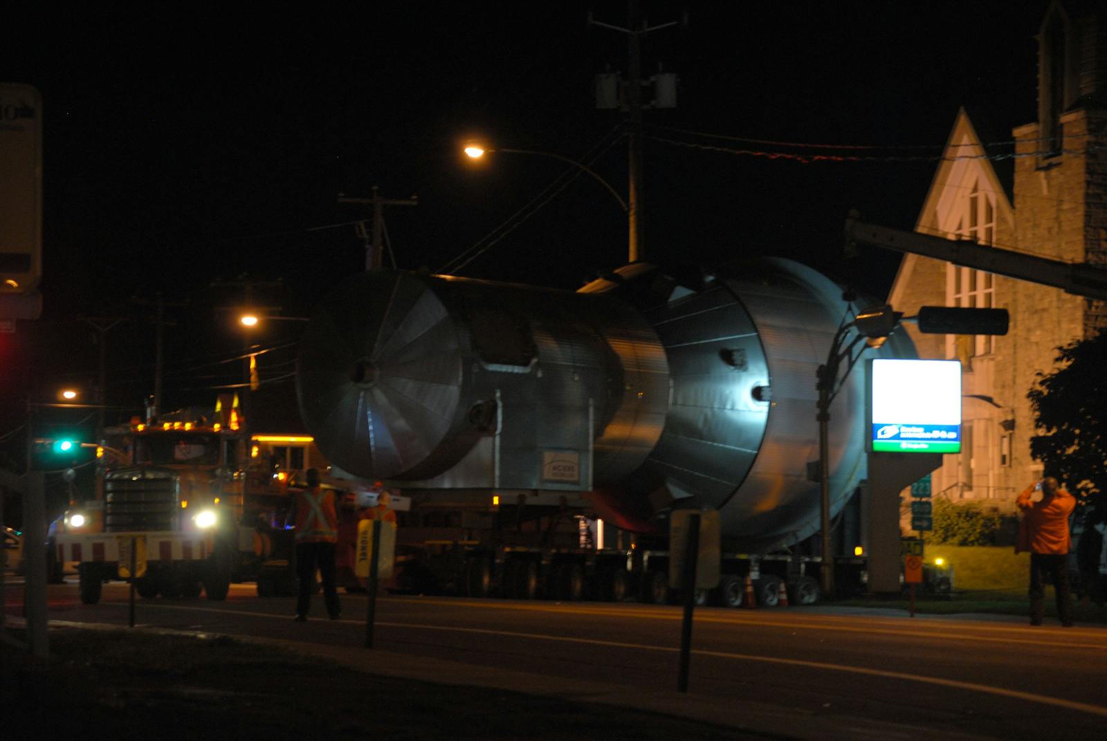 uge steel component being transported in the street